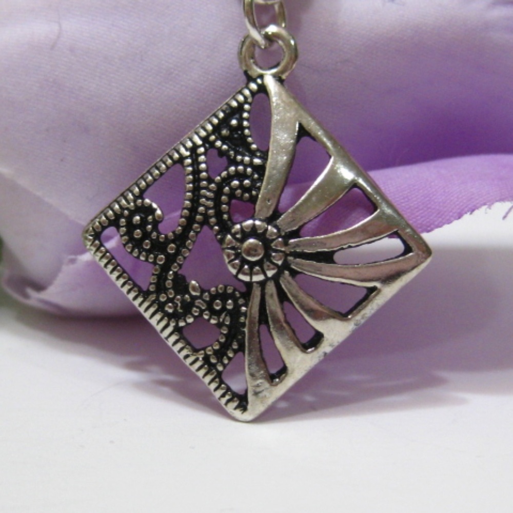Antique silver geometric pendant